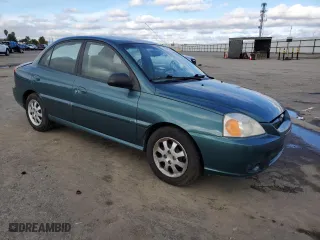 2004 Kia Rio with VIN KNADC125546294695, listed as a Copart auction lot 86914954 with 147,260 mi miles and Salvage Title. Bid and sale history available at carsss.com. Image 4.