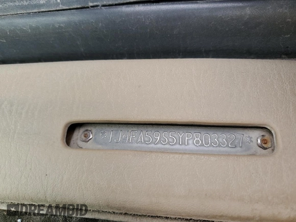 2000 Jeep Wrangler Sahara z VIN 1J4FA59S5YP803327, wystawiony jako Copart lot #44382505 z przebiegiem Nie podano mil oraz Szkoda całkowita • Salvage title. Historia ofert i sprzedaży dostępna na DreamBid. Obrazek 15.