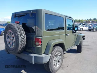 2015 Jeep Wrangler Rubicon Hard Rock with VIN 1C4BJWCGXFL771669, listed as a IAAI auction lot 42057423 with 36,996 mi miles and . Bid and sale history available at DreamBid. Image 4.