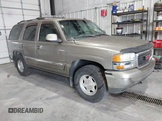 2003 GMC Yukon SLT z VIN 1GKEK13Z13J137273, wystawiony jako IAAI lot #42467587 z przebiegiem 354 437 mil mil oraz . Historia ofert i sprzedaży dostępna na DreamBid. Obrazek 1.