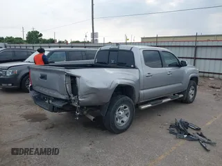 2017 Toyota Tacoma SR with VIN 5TFAX5GN6HX083614, listed as a IAAI auction lot 42314254 with 104,407 mi miles and . Bid and sale history available at DreamBid. Image 4.