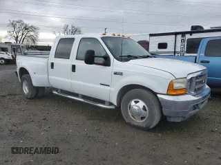 2001 Ford F-350 XL z VIN 1FTWW32F01ED08768, wystawiony jako Copart lot #62873634 z przebiegiem 317 184 mil mil oraz Szkoda całkowita • Salvage title. Historia ofert i sprzedaży dostępna na DreamBid. Obrazek 4.