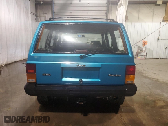 1994 Jeep Cherokee Sport with VIN 1J4FJ68S5RL109124, listed as a Copart auction lot 85524644 with 369,388 mi miles and Salvage title. Bid and sale history available at DreamBid. Image 6.