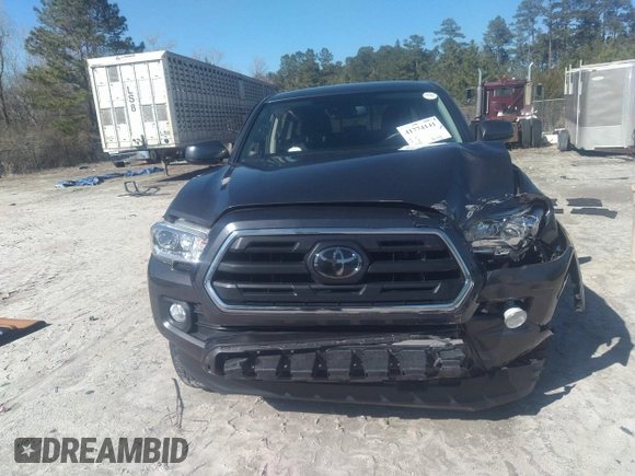 2018 Toyota Tacoma SR5 with VIN 5TFAZ5CN0JX056706, listed as a IAAI auction lot 41774141 with 31,738 mi miles and . Bid and sale history available at DreamBid. Image 12.