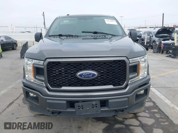 2018 Ford F-150 XL with VIN 1FTEW1EP4JKD45070, listed as a IAAI auction lot 42648874 with 140,424 mi miles and . Bid and sale history available at DreamBid. Image 13.