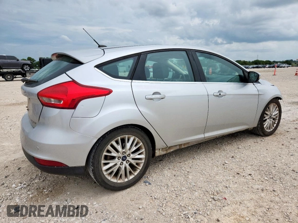 2017 Ford Focus Titanium with VIN 1FADP3N28HL346418, listed as a Copart auction lot 63507125 with 107,761 mi miles and Salvage title. Bid and sale history available at DreamBid. Image 3.