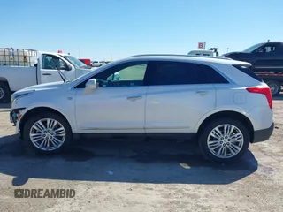 2017 Cadillac XT5 Premium Luxury FWD z VIN 1GYKNCRS9HZ106397, wystawiony jako IAAI lot #41659420 z przebiegiem 54 615 mil mil oraz . Historia ofert i sprzedaży dostępna na DreamBid. Obrazek 15.