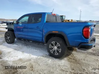2024 GMC Canyon 4WD AT4 z VIN 1GTP6DEKXR1197281, wystawiony jako Copart lot #48731345 z przebiegiem 4 708 mil mil oraz Szkoda całkowita • Salvage title. Historia ofert i sprzedaży dostępna na DreamBid. Obrazek 2.