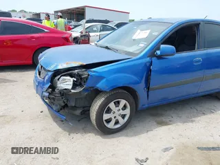 2008 Kia Rio LX with VIN KNADE123886374992, listed as a IAAI auction lot 42027536 with 129,916 mi miles and . Bid and sale history available at DreamBid. Image 6.