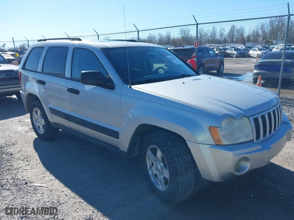 2005 Jeep Grand Cherokee Laredo with VIN 1J4HR48N65C537469, listed as a IAAI auction lot 41676555 with 226,084 mi miles. Bid and sale history available at carsss.com. Image 1.