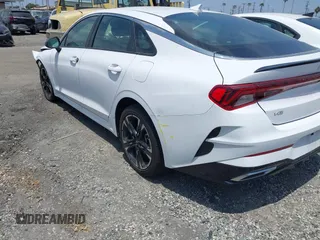 2023 Kia K5 GT-Line z VIN 5XXG64J25PG220733, wystawiony jako IAAI lot #42109640 z przebiegiem 30 917 mil mil oraz . Historia ofert i sprzedaży dostępna na DreamBid. Obrazek 3.