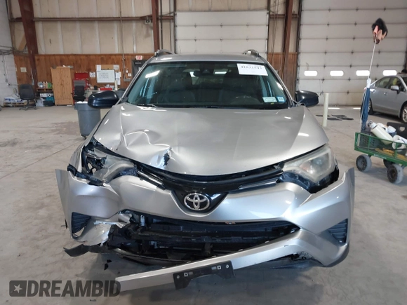 2017 Toyota RAV4 LE with VIN 2T3BFREV6HW642228, listed as a IAAI auction lot 41832543 with 127,830 mi miles. Bid and sale history available at carsss.com. Image 12.
