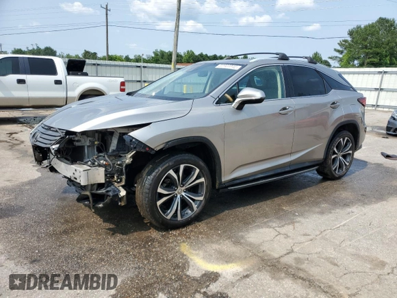 2017 Lexus RX 350 with VIN 2T2ZZMCA2HC052610, listed as a Copart auction lot 58565945 with 137,956 mi miles and Salvage title. Bid and sale history available at DreamBid. Image 1.