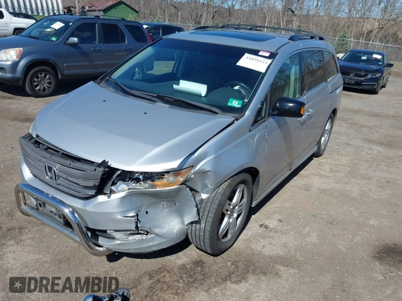 2012 Honda Odyssey Touring with VIN 5FNRL5H93CB042392, listed as a IAAI auction lot 41859533 with 169,141 mi miles. Bid and sale history available at carsss.com. Image 17.