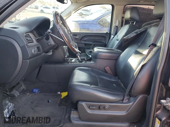 2013 GMC Yukon Denali with VIN 1GKS1EEF0DR205906, listed as a Copart auction lot 87969385 with 128,283 mi miles and Salvage Title. Bid and sale history available at carsss.com. Image 7.