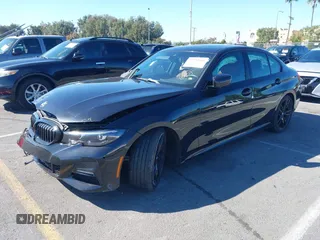 2022 BMW 3 Series 330i with VIN 3MW5R1J06N8C70943, listed as a IAAI auction lot 37735551 with 11,201 mi miles and . Bid and sale history available at DreamBid. Image 2.