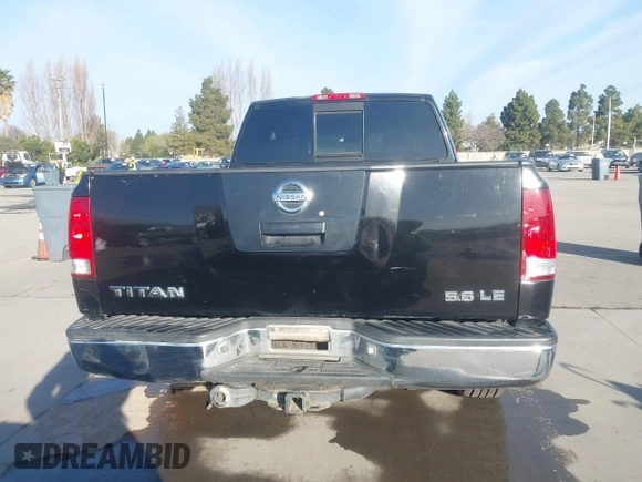 2004 Nissan Titan SE with VIN 1N6AA06A14N574940, listed as a IAAI auction lot 41821005 with 202,373 mi miles. Bid and sale history available at carsss.com. Image 16.