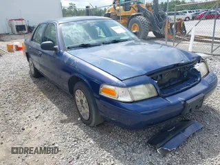 2005 Ford Police Interceptor z VIN 2FAHP71W45X123163, wystawiony jako IAAI lot #42541578 z przebiegiem 193 689 mil mil oraz . Historia ofert i sprzedaży dostępna na DreamBid. Obrazek 1.