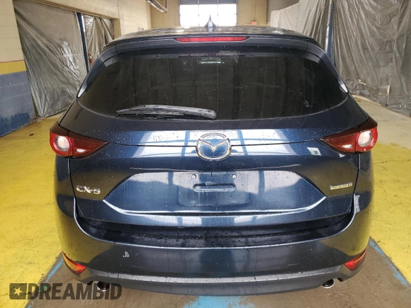 2021 Mazda CX-5 Touring with VIN JM3KFACMXM0334139, listed as a Copart auction lot 55362905 with 117,279 mi miles and Clean Title. Bid and sale history available at DreamBid. Image 6.