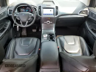2020 Ford Edge Titanium z VIN 2FMPK4K97LBA56544, wystawiony jako Copart lot #59314005 z przebiegiem 84 861 mil mil oraz Czysty tytuł • Clean title. Historia ofert i sprzedaży dostępna na DreamBid. Obrazek 8.