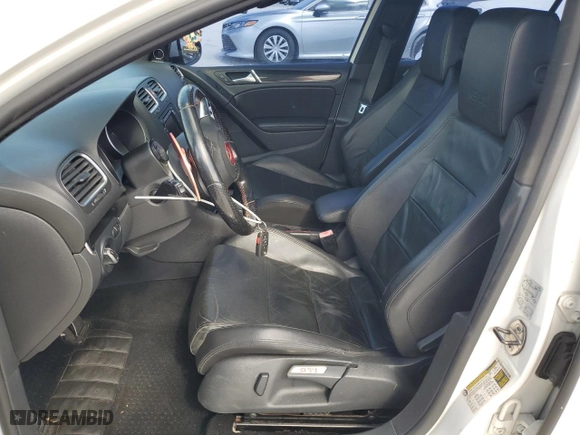 2011 Volkswagen GTI w/Sunroof PZEV with VIN WVWHD7AJ6BW189664, listed as a Copart auction lot 52083735 with 124,677 mi miles and Clean Title. Bid and sale history available at carsss.com. Image 7.