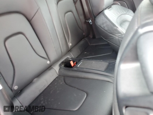 2014 Audi S5 Premium Plus z VIN WAUCGAFH5EN015371, wystawiony jako Copart lot #74150454 z przebiegiem Nie podano mil oraz Szkody całkowita. Historia ofert i sprzedaży dostępna na DreamBid. Obrazek 10.