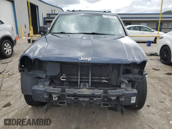 2009 Jeep Grand Cherokee Laredo with VIN 1J8HR48P49C545334, listed as a Copart auction lot 71562344 with 183,976 mi miles and Salvage Title. Bid and sale history available at carsss.com. Image 5.