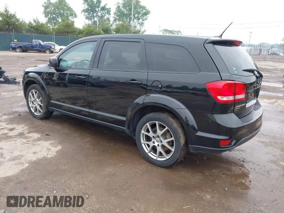 2015 Dodge Journey R/T with VIN 3C4PDDEG1FT554904, listed as a IAAI auction lot 42415888 with 143,039 mi miles and . Bid and sale history available at DreamBid. Image 3.