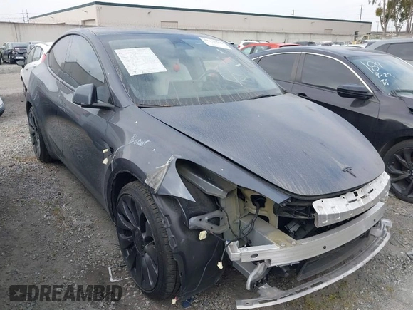 2023 Tesla Model Y Performance z VIN 7SAYGDEF6PF774965, wystawiony jako IAAI lot #41655550 z przebiegiem 33 824 mil mil oraz . Historia ofert i sprzedaży dostępna na DreamBid. Obrazek 1.