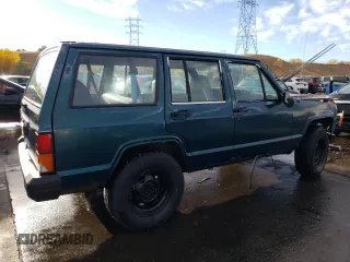 1996 Jeep Cherokee SE z VIN 1J4FJ28S6TL184205, wystawiony jako Copart lot #77558034 z przebiegiem 195 000 mil mil oraz Tytuł czysty. Historia ofert i sprzedaży dostępna na DreamBid. Obrazek 3.