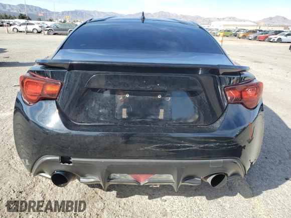 2017 Toyota 86 z VIN JF1ZNAA11H8704619, wystawiony jako Copart lot #50272835 z przebiegiem 104 096 mil mil oraz Szkoda całkowita • Salvage title. Historia ofert i sprzedaży dostępna na DreamBid. Obrazek 6.