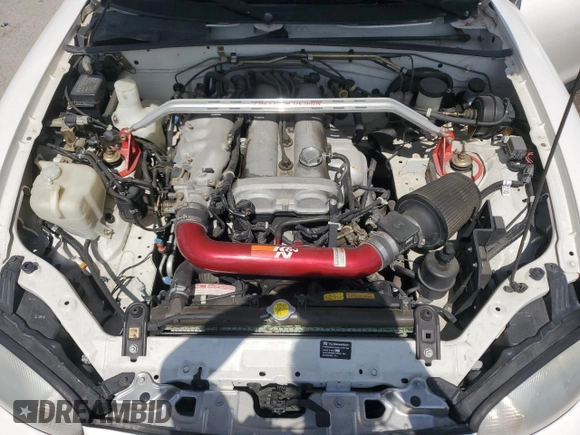 2000 Mazda MX-5 Miata with VIN JM1NB3531Y0152594, listed as a Copart auction lot 57460195 with 78,139 mi miles and Salvage title. Bid and sale history available at DreamBid. Image 11.