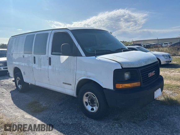2003 GMC Savana Cargo z VIN 1GTHG35U431113170, wystawiony jako Copart lot #88987945 z przebiegiem 293 807 mil mil oraz Tytuł czysty. Historia ofert i sprzedaży dostępna na DreamBid. Obrazek 1.
