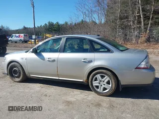 2008 Ford Taurus SEL z VIN 1FAHP24WX8G132507, wystawiony jako IAAI lot #42013031 z przebiegiem 110 805 mil mil oraz . Historia ofert i sprzedaży dostępna na DreamBid. Obrazek 13.