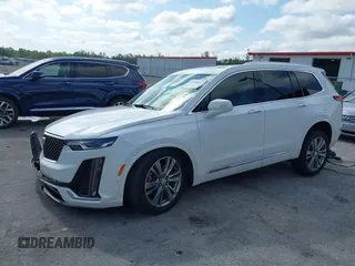 2023 Cadillac XT6 FWD Premium Luxury with VIN 1GYKPCRS3PZ186210, listed as a IAAI auction lot 42290027 with 44,117 mi miles and . Bid and sale history available at DreamBid. Image 2.