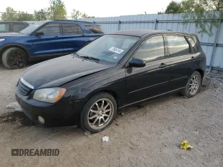 2005 Kia Spectra with VIN KNAFE161255088283, listed as a Copart auction lot 73654744 with 169,947 mi miles and Salvage Title. Bid and sale history available at carsss.com. Image 1.