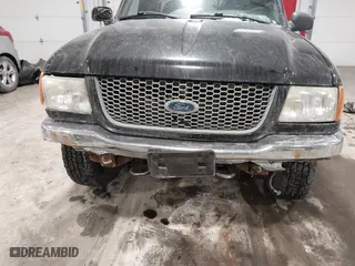 2003 Ford Ranger XL Fleet with VIN 1FTZR45EX3PA60520, listed as a IAAI auction lot 41591797 with 205,040 mi miles. Bid and sale history available at carsss.com. Image 6.