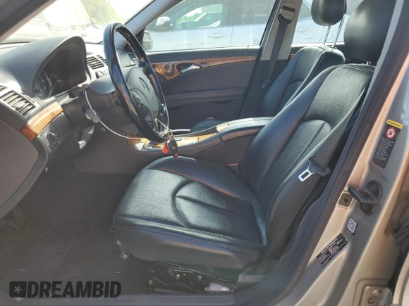 2003 Mercedes-Benz E 320 with VIN WDBUF65J13A234665, listed as a Copart auction lot 51797834 with 300,159 mi miles and Salvage Title. Bid and sale history available at DreamBid. Image 7.