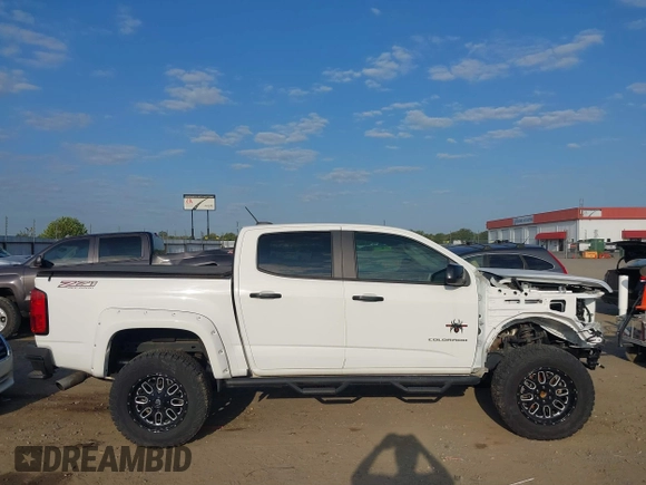 2021 Chevrolet Colorado 4WD Z71 with VIN 1GCGTDEN6M1166282, listed as a IAAI auction lot 40316921 with 35,515 mi miles and . Bid and sale history available at DreamBid. Image 13.