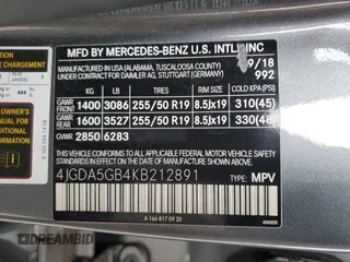 2019 Mercedes-Benz GLE 400 with VIN 4JGDA5GB4KB212891, listed as a Copart auction lot 57131075 with 77,710 mi miles and Salvage title. Bid and sale history available at DreamBid. Image 14.