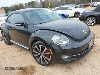 2012 Volkswagen Beetle 2.0T Turbo with VIN 3VW467AT9CM658495, listed as a IAAI auction lot 41505160 with 138,842 mi miles. Bid and sale history available at carsss.com. Image 1.