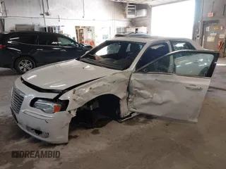 2014 Chrysler 300 with VIN 2C3CCAAGXEH217715, listed as a IAAI auction lot 41666179 with 145,744 mi miles and . Bid and sale history available at DreamBid. Image 6.