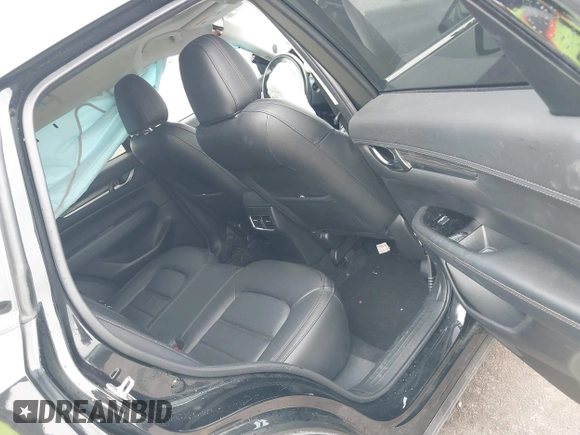 2020 Mazda CX-5 Grand Touring with VIN JM3KFADM8L0811910, listed as a IAAI auction lot 41446214 with 57,849 mi miles. Bid and sale history available at carsss.com. Image 8.