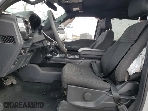 2023 Ford F-150 XL with VIN 1FTEW1CP4PKF86851, listed as a Copart auction lot 50611185 with 15,773 mi miles and Salvage Title. Bid and sale history available at DreamBid. Image 7.