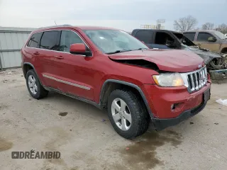 2011 Jeep Grand Cherokee Laredo with VIN 1J4RR4GG7BC701623, listed as a Copart auction lot 50833135 with 268,773 mi miles and Salvage Title. Bid and sale history available at DreamBid. Image 4.