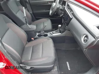 2019 Toyota Corolla L with VIN 2T1BURHEXKC228937, listed as a IAAI auction lot 41979191 with 107,413 mi miles and . Bid and sale history available at carsss.com. Image 5.