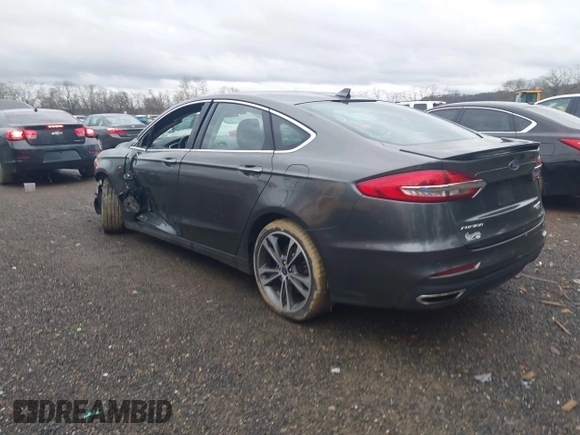 2019 Ford Fusion Titanium with VIN 3FA6P0D93KR124299, listed as a IAAI auction lot 40182478 with 73,408 mi miles. Bid and sale history available at carsss.com. Image 3.