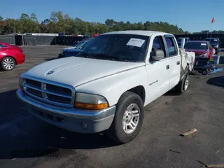 2001 Dodge Dakota Sport with VIN 1B7GL2AN81S127838, listed as a IAAI auction lot 40687174 with 235,301 mi miles. Bid and sale history available at carsss.com. Image 2.
