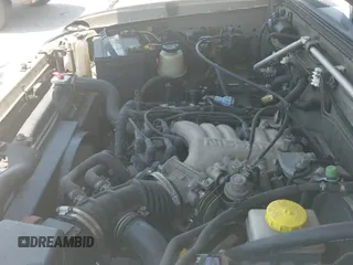 2003 Nissan Frontier XE z VIN 1N6ED29Y03C450987, wystawiony jako IAAI lot #42600507 z przebiegiem 143 488 mil mil oraz . Historia ofert i sprzedaży dostępna na DreamBid. Obrazek 19.