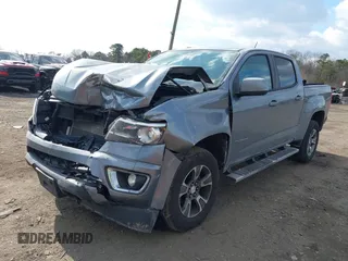 2018 Chevrolet Colorado 4WD Z71 z VIN 1GCGTDENXJ1133572, wystawiony jako IAAI lot #41437941 z przebiegiem 82 254 mil mil oraz . Historia ofert i sprzedaży dostępna na DreamBid. Obrazek 6.